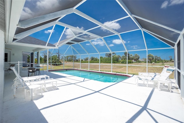 162 Fairway Rd, Rotonda West, FL 33947 - pool featuring a patio and glass enclosure
