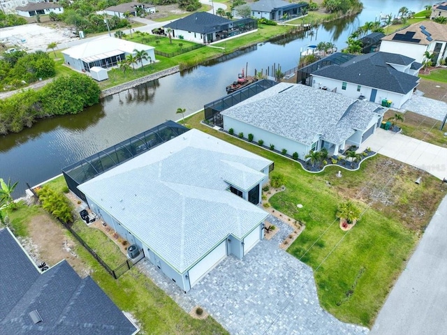aerial view featuring a residential view and a water view