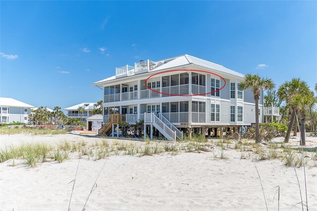 7548 Palm Island Dr S Unit 1724, Placida, FL 33946 - rear view of house featuring stairway and a balcony