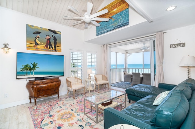 7548 Palm Island Dr S Unit 1724, Placida, FL 33946 - living area featuring a ceiling fan, baseboards, recessed lighting, wood finished floors, and a water view