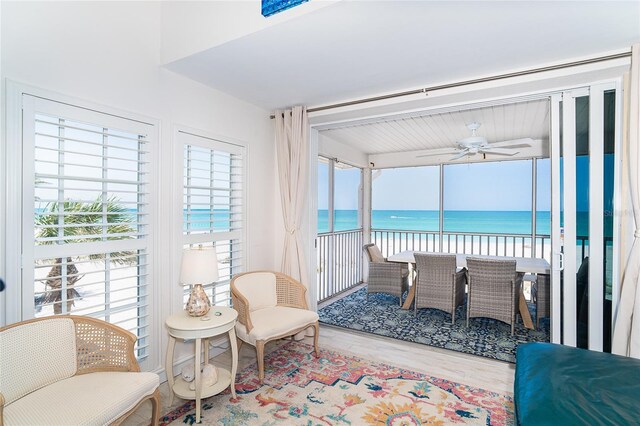 7548 Palm Island Dr S Unit 1724, Placida, FL 33946 - sunroom featuring a healthy amount of sunlight and a water view