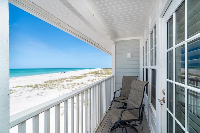 7548 Palm Island Dr S Unit 1724, Placida, FL 33946 - balcony featuring a water view and a beach view