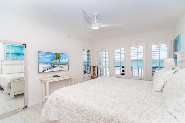 7548 Palm Island Dr S Unit 1724, Placida, FL 33946 - bedroom featuring crown molding, a ceiling fan, and access to exterior