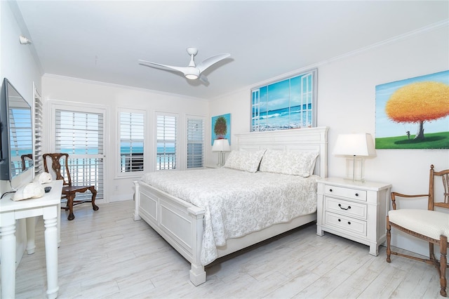 7548 Palm Island Dr S Unit 1724, Placida, FL 33946 - bedroom with light wood-type flooring, crown molding, and ceiling fan