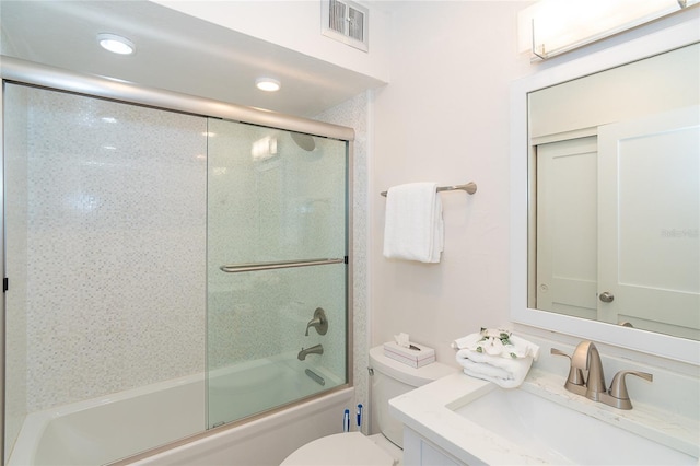 7548 Palm Island Dr S Unit 1724, Placida, FL 33946 - bathroom featuring shower / bath combination with glass door, vanity, toilet, recessed lighting, and visible vents