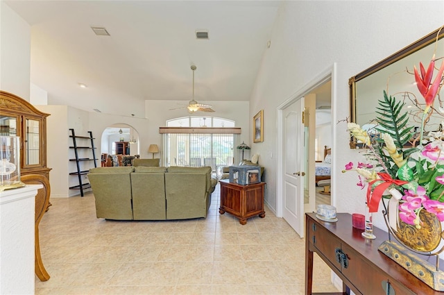 living room featuring high vaulted ceiling, a ceiling fan, light tile patterned flooring, and visible vents