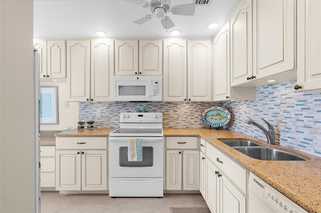 2950 N Beach Rd Unit B324, Englewood, FL 34223 - kitchen featuring a sink, a ceiling fan, white appliances, and light tile patterned flooring