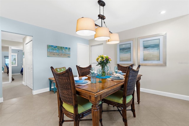2950 N Beach Rd Unit B324, Englewood, FL 34223 - dining space with baseboards and light tile patterned flooring