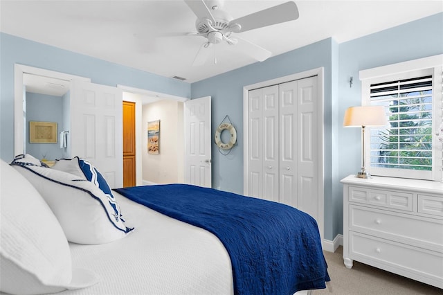 2950 N Beach Rd Unit B324, Englewood, FL 34223 - bedroom with a closet, a ceiling fan, baseboards, and light carpet