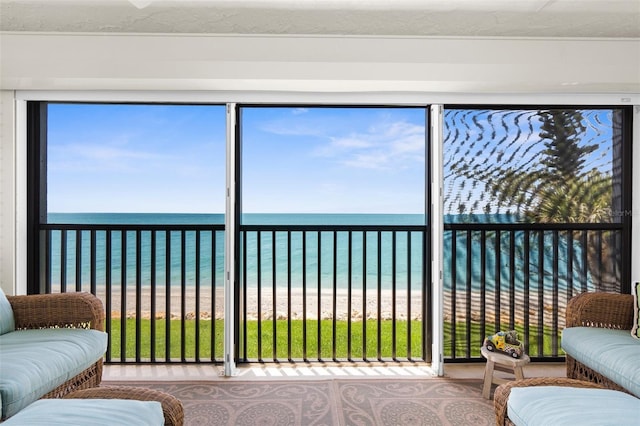 2950 N Beach Rd Unit B324, Englewood, FL 34223 - sunroom / solarium with a water view and a view of the beach