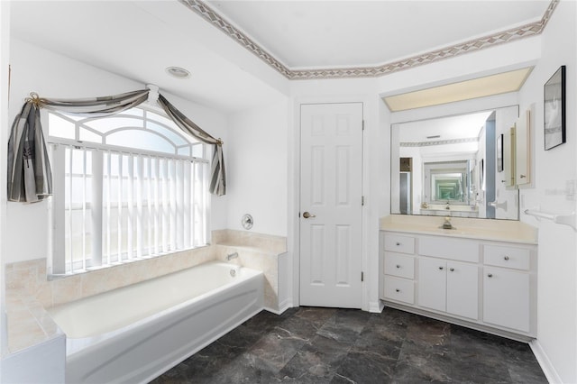 full bathroom featuring a bath and vanity