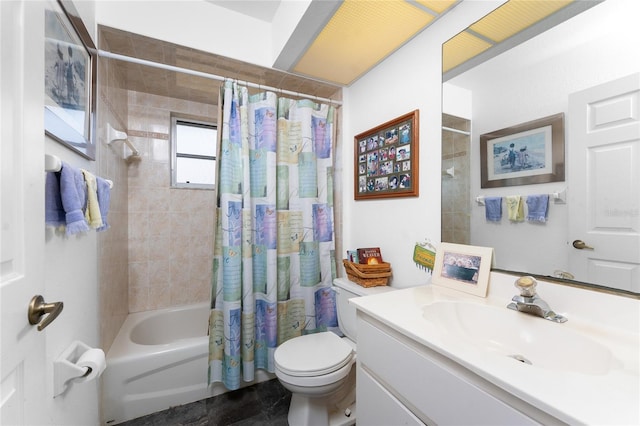 bathroom with vanity, toilet, and shower / bath combination with curtain