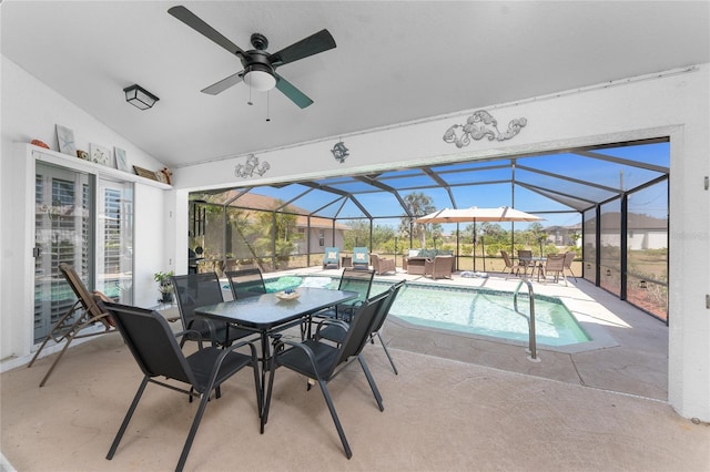outdoor pool featuring ceiling fan, a lanai, outdoor dining area, a patio area, and a hot tub