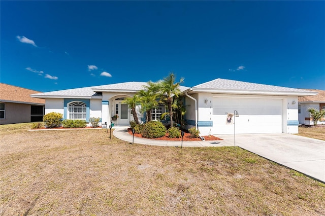 ranch-style home with a garage, stucco siding, driveway, and a front lawn