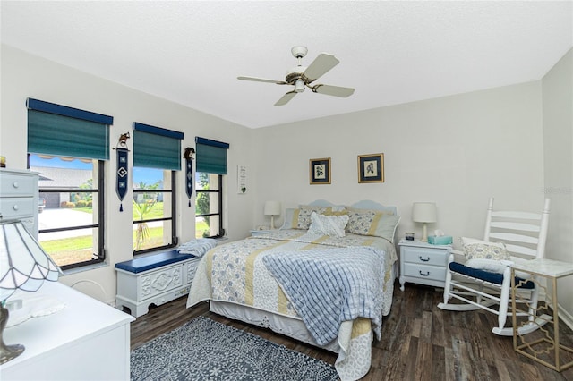 bedroom with ceiling fan and wood finished floors