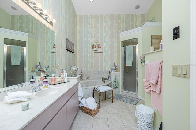 full bath featuring a bath, a stall shower, vanity, tile patterned floors, and wallpapered walls