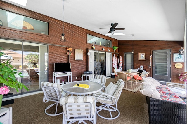 exterior space with a ceiling fan and outdoor dining area