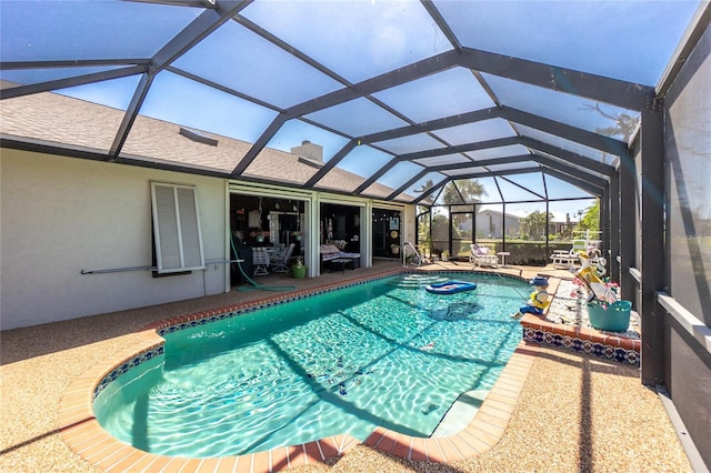 outdoor pool featuring a patio