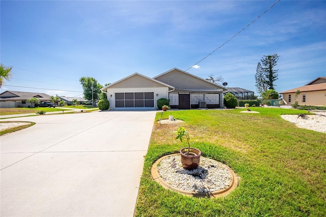 ranch-style home with an attached garage, driveway, and a front lawn