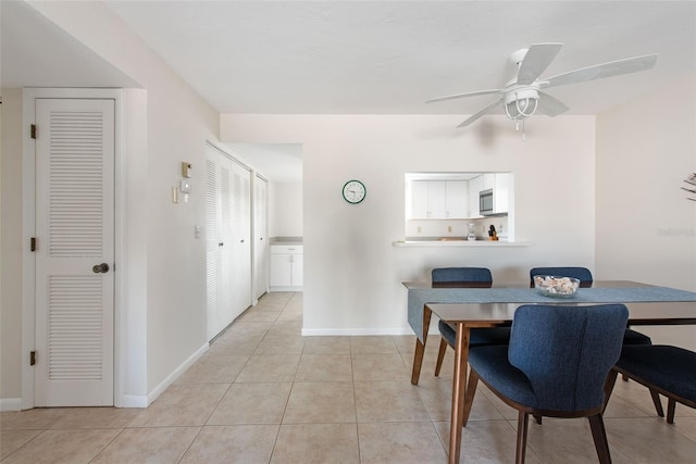 1531 Placida Rd Unit 4-103, Englewood, FL 34223 - dining space with light tile patterned flooring, ceiling fan, and baseboards