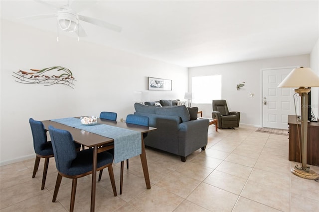 1531 Placida Rd Unit 4-103, Englewood, FL 34223 - dining area with light tile patterned floors, baseboards, and a ceiling fan