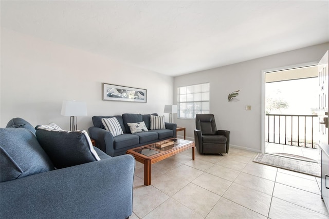 1531 Placida Rd Unit 4-103, Englewood, FL 34223 - living area featuring light tile patterned floors and baseboards