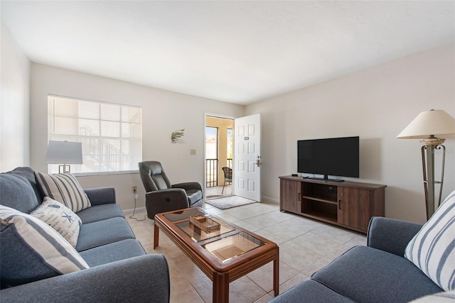 1531 Placida Rd Unit 4-103, Englewood, FL 34223 - living area featuring light tile patterned floors and baseboards