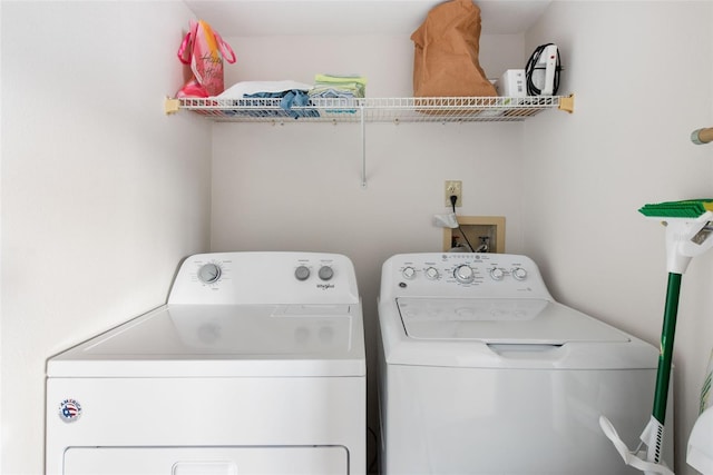 1531 Placida Rd Unit 4-103, Englewood, FL 34223 - washroom with washer and clothes dryer