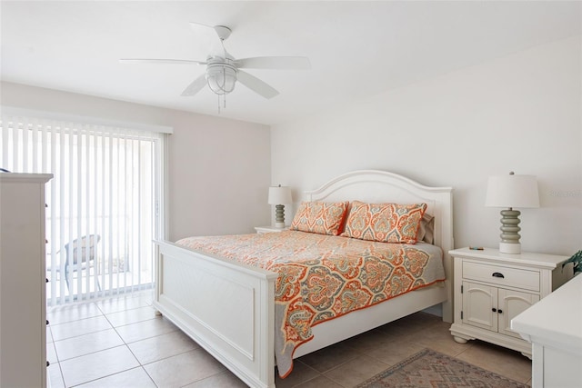 1531 Placida Rd Unit 4-103, Englewood, FL 34223 - bedroom with light tile patterned flooring, access to exterior, and a ceiling fan