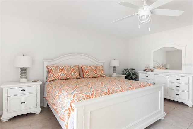 1531 Placida Rd Unit 4-103, Englewood, FL 34223 - bedroom with light tile patterned floors and ceiling fan