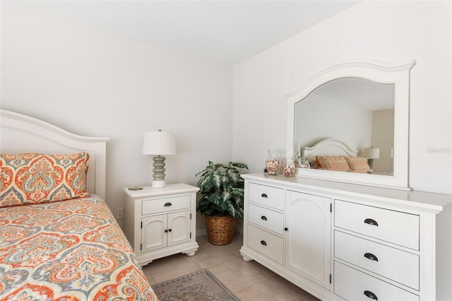 1531 Placida Rd Unit 4-103, Englewood, FL 34223 - bedroom featuring light tile patterned floors