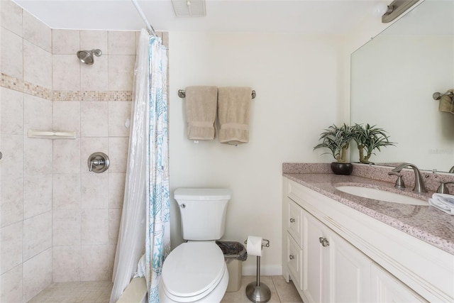 1531 Placida Rd Unit 4-103, Englewood, FL 34223 - bathroom with tile patterned floors, vanity, a tile shower, and toilet