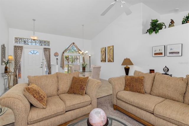living room with high vaulted ceiling and ceiling fan