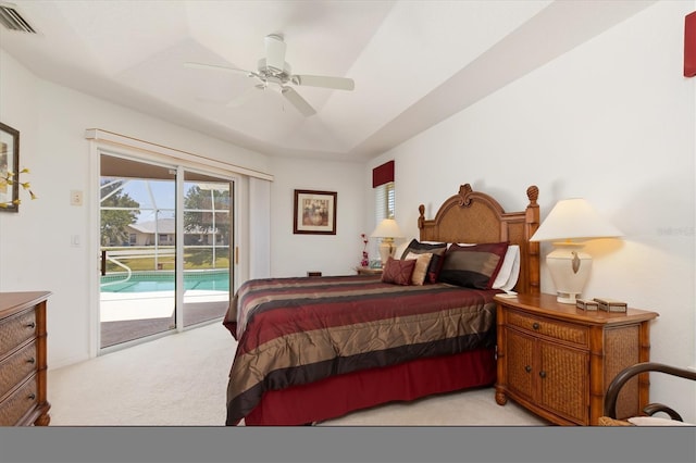 bedroom featuring light colored carpet, access to outside, a ceiling fan, and visible vents