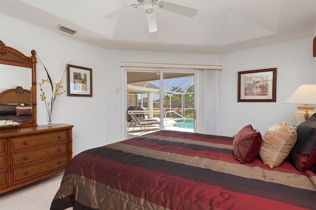 bedroom with access to outside, carpet, ceiling fan, and visible vents