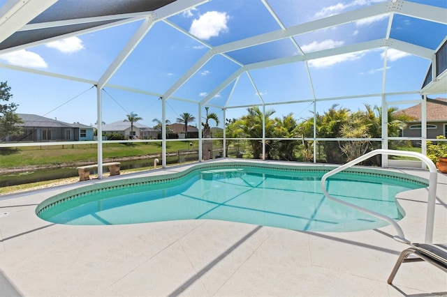 outdoor pool featuring a patio and a residential view