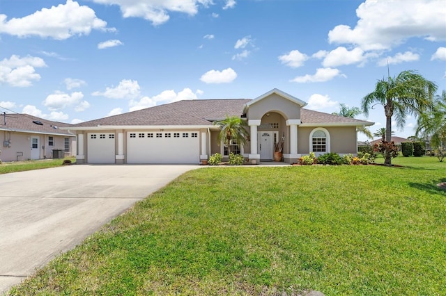 view of front of house with an attached garage, concrete driveway, stucco siding, and a front yard