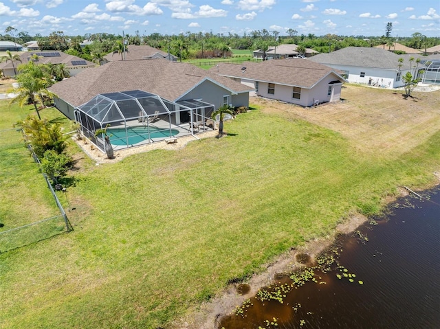 bird's eye view with a residential view and a water view