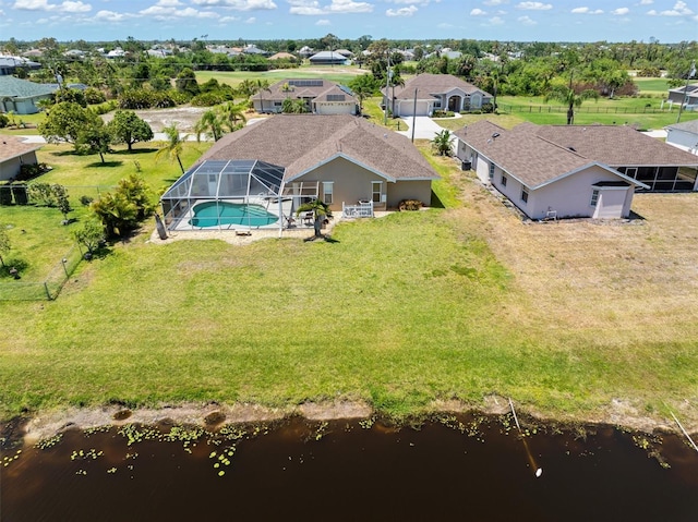 aerial view featuring a residential view and a water view