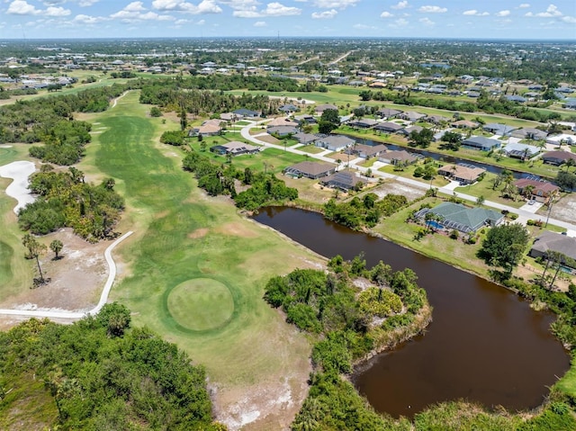 aerial view featuring a residential view, view of golf course, and a water view