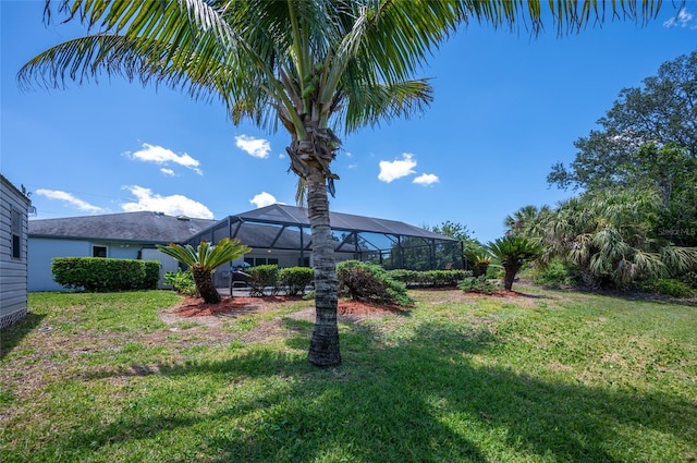 view of yard featuring a lanai