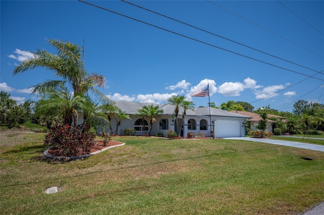 ranch-style house with concrete driveway, a front yard, stucco siding, and an attached garage