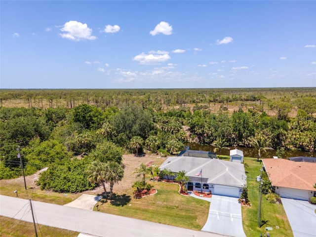 aerial view with a wooded view