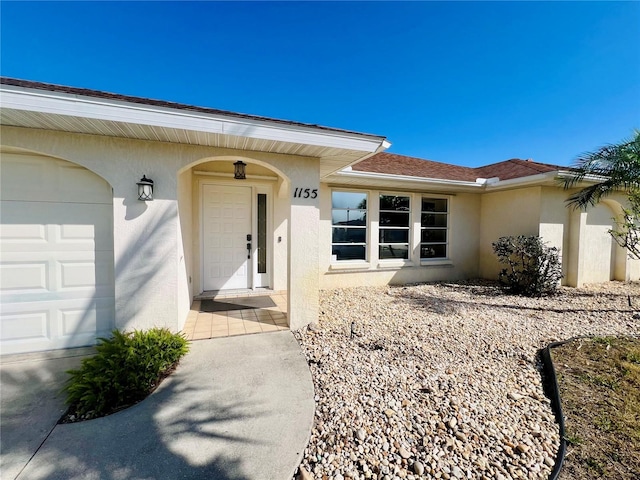 1155 Osceola Blvd, Englewood, FL 34223 - entrance to property featuring stucco siding