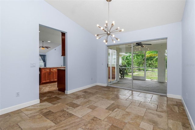 1155 Osceola Blvd, Englewood, FL 34223 - unfurnished room featuring baseboards, lofted ceiling, ceiling fan with notable chandelier, and stone tile flooring