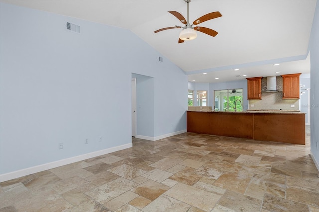 1155 Osceola Blvd, Englewood, FL 34223 - unfurnished living room featuring high vaulted ceiling, stone tile flooring, visible vents, baseboards, and ceiling fan