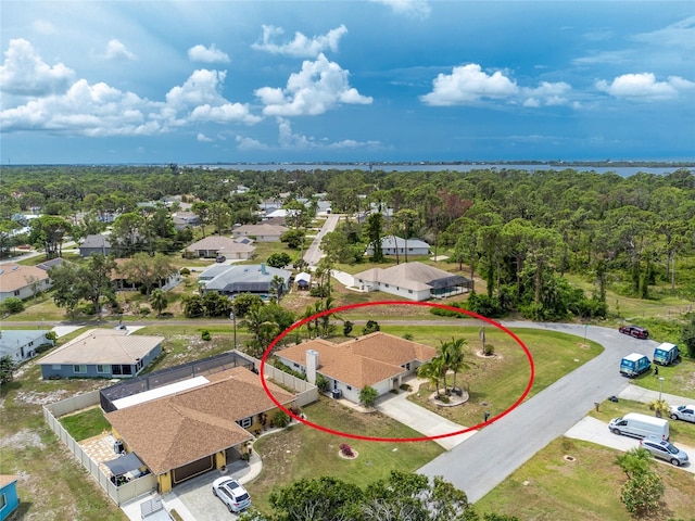 1155 Osceola Blvd, Englewood, FL 34223 - birds eye view of property featuring a wooded view and a residential view