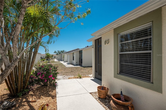 6796 Gasparilla Pines Blvd Unit 63, Englewood, FL 34224 - view of yard with a patio
