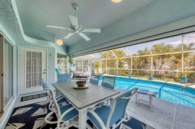 11 Amberjack Ln, Placida, FL 33946 - sunroom featuring a ceiling fan, a pool, and outdoor dining area