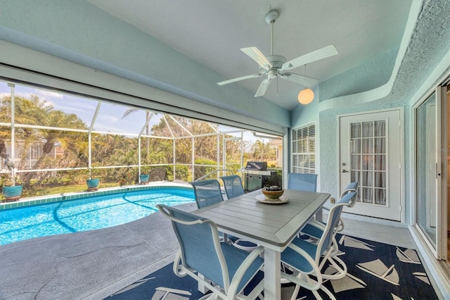 11 Amberjack Ln, Placida, FL 33946 - outdoor pool featuring glass enclosure, ceiling fan, and a patio area
